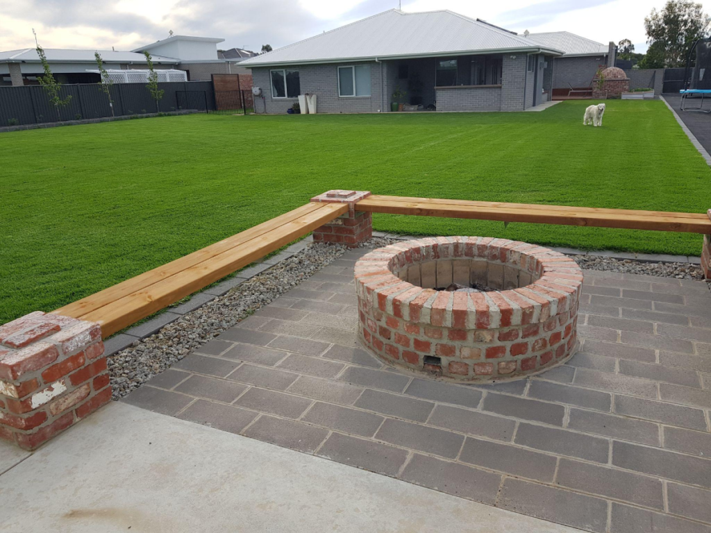 brick DIY firepit in the backyard of a family home in Melbourne, Victoria