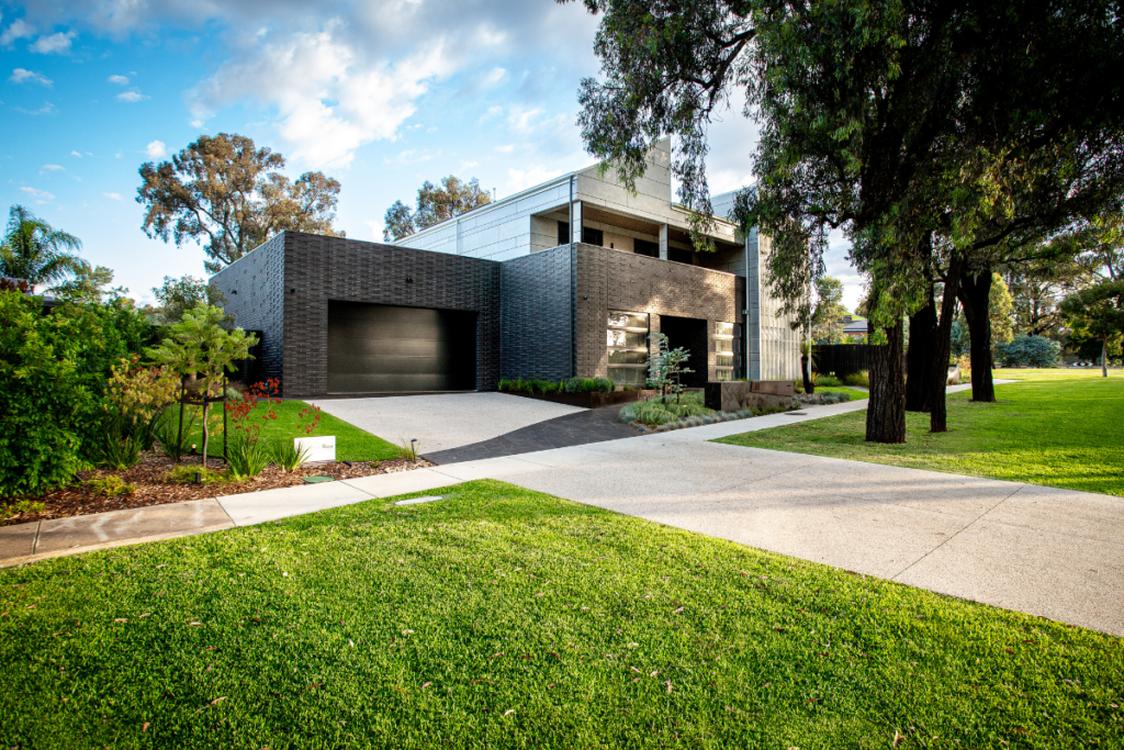 A lush Sir Walter DNA Certified Buffalo lawn improving the kerb appeal and home value of a Victorian property.